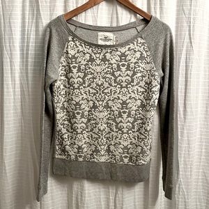 Gray sweater with white pattern